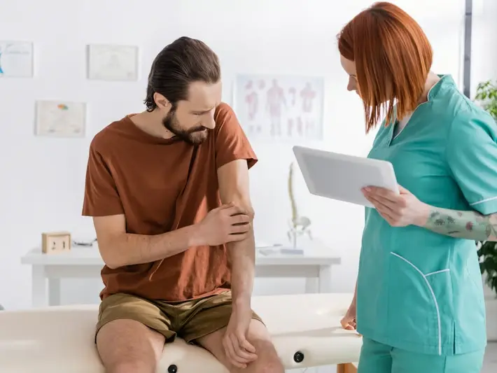 Tennessee licensed accident clinic team reviewing injury records for Hendersonville work injury case